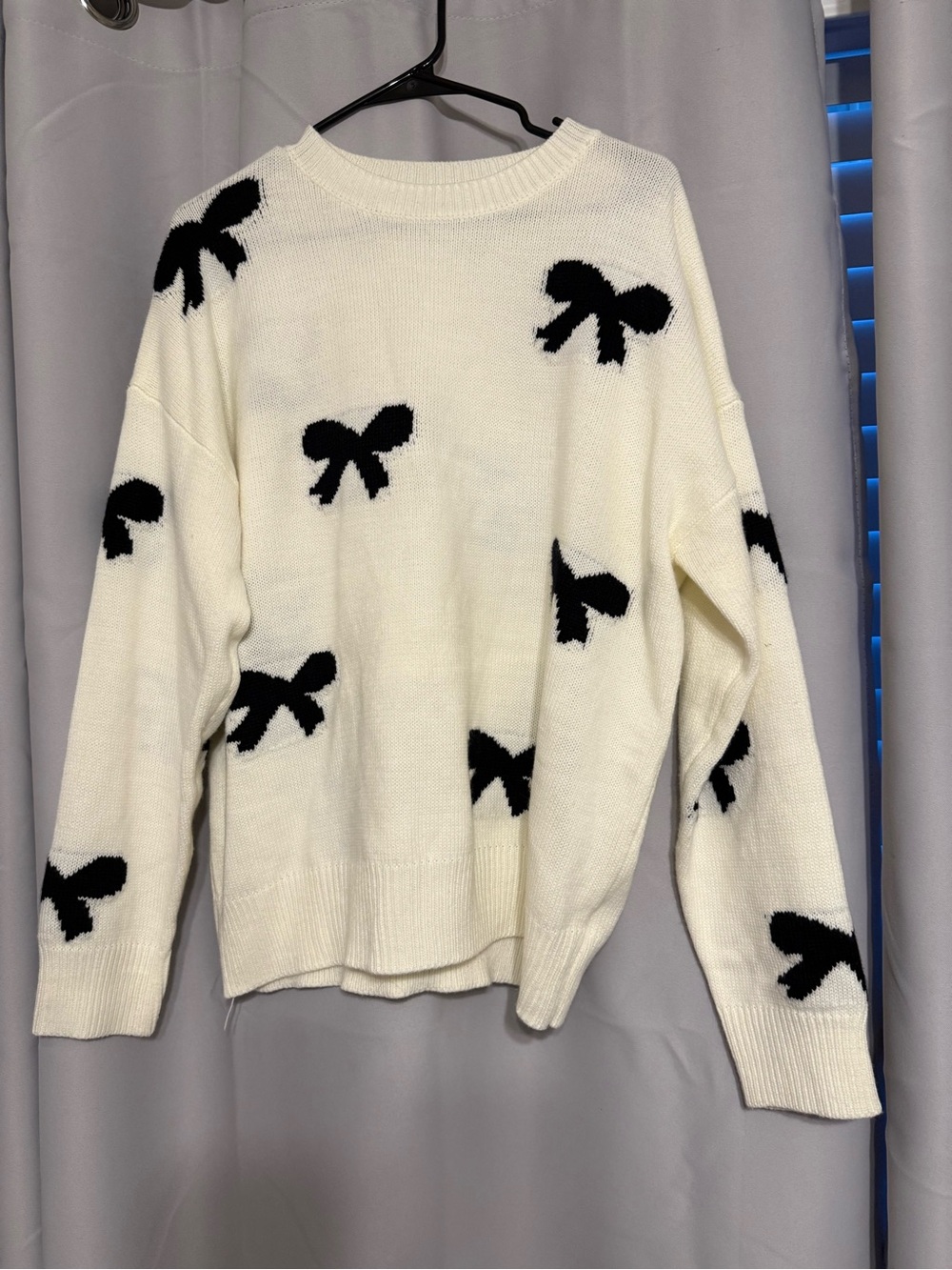 White Bow Pattern Crewneck Sweater - Women's